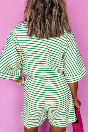 Green striped resort shirt romper with tie, short sleeves, elastic waist, and shorts.