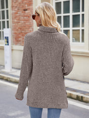 Ribbed turtleneck sweater in mocha with side slits and long sleeves.