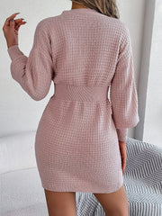 Blush pink cable knit dress with button front and hourglass silhouette