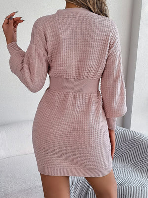 Blush pink cable knit dress with button front and hourglass silhouette