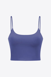Light blue crop tank top with scoop neckline and thin spaghetti straps