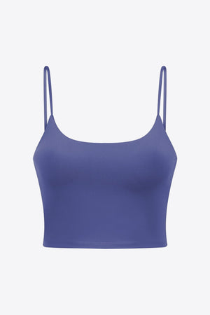 Light blue crop tank top with scoop neckline and thin spaghetti straps