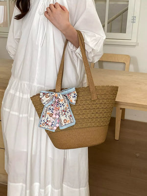 Straw Woven Shoulder Bag in Brown, model styling view
