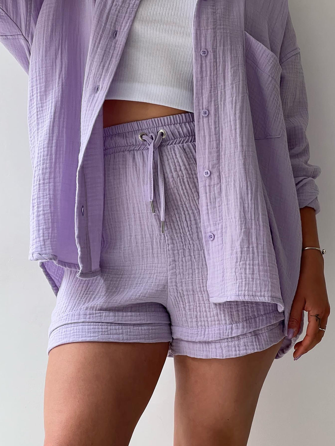 Lavender textured gauze shirt and shorts set with drawstring waist.