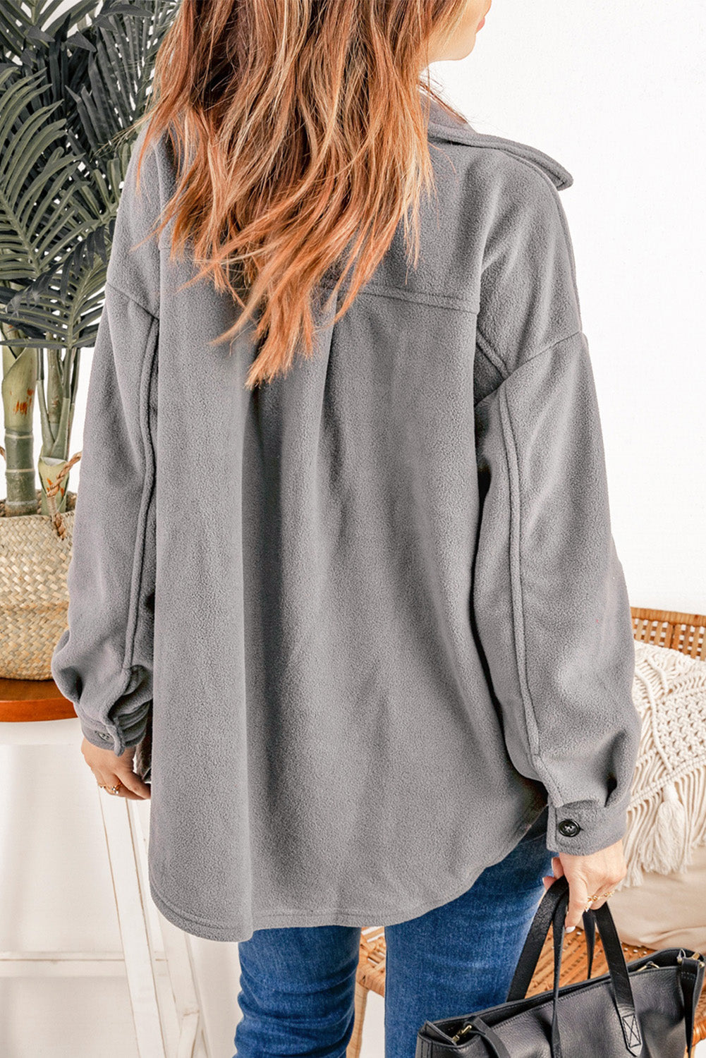 Fleece shirt jacket in Charcoal with button cuffs and patch pocket detail.