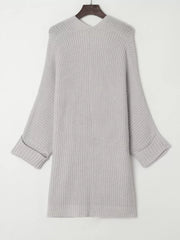 Light gray acrylic knit cardigan with open front, ribbed texture, and cuffed sleeves.