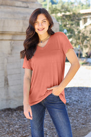 V-neck pocket tee in watermelon pink with short sleeves and a relaxed fit.