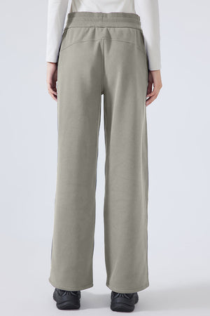 Relaxed palazzo sweatpants in sage with drawstring waist and wide leg