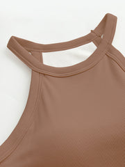 Camel ribbed halter tank top with built-in bra and white lining detail.