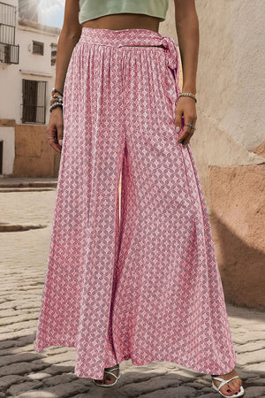 Pink geometric print wide-leg palazzo trousers with a tie waist