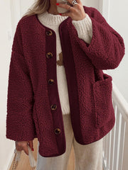 Burgundy teddy-texture button-up jacket with corduroy trim and pockets.