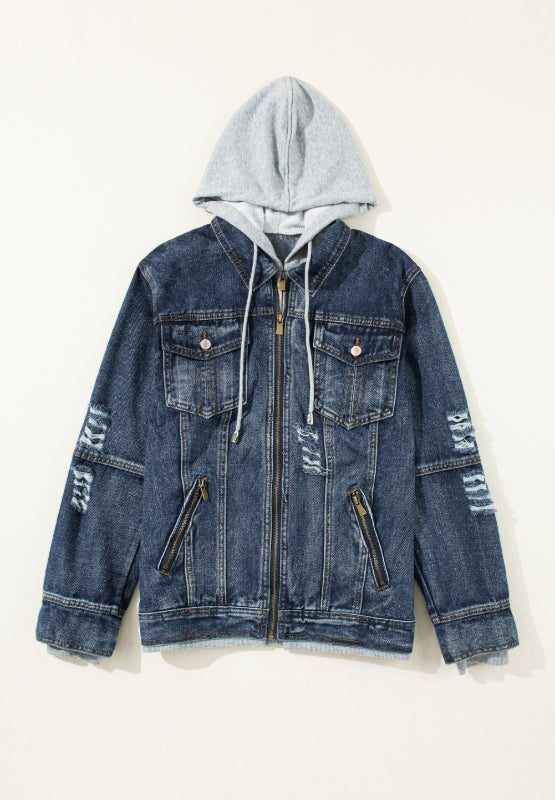 Dark blue denim jacket with grey hooded layer, distressed details and zippered pockets.