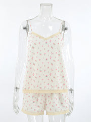 Floral lace trim cami and shorts set with adjustable straps and delicate pink floral pattern.