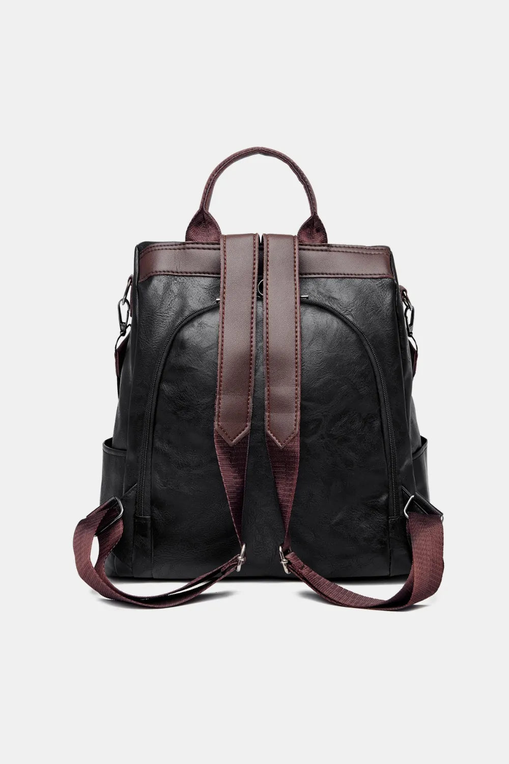 Black structured leather convertible backpack with brown trim and straps