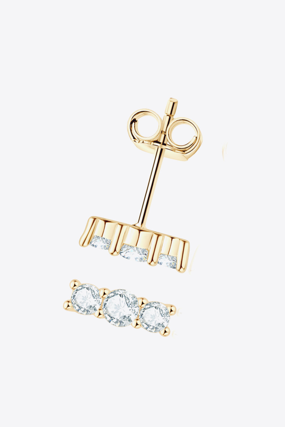 Gold triple stone bar stud earrings with clear cubic zirconia stones.