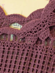 Deep purple crochet tank top with floral overlay detail and open knit pattern.
