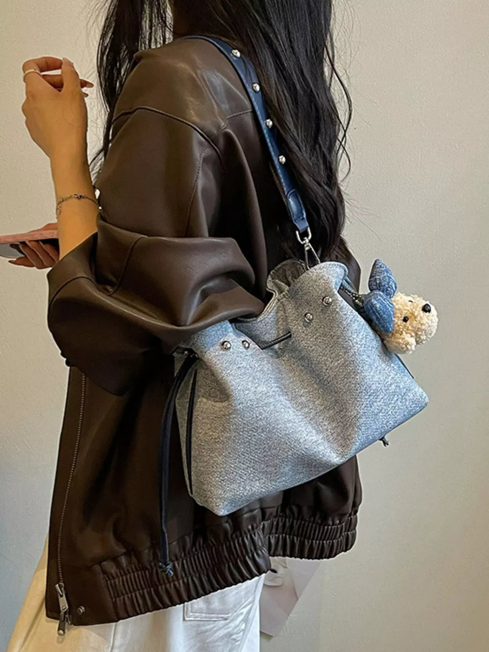 Bucket Crossbody Bag in Blue, model styling view