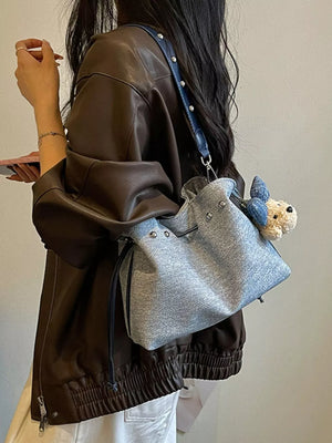 Bucket Crossbody Bag in Blue, model styling view
