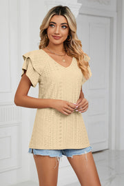 Light Yellow eyelet knit blouse with V-neck and flutter sleeves.
