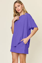 Waffle knit boxy tee and shorts set in purple with short sleeves and pockets.