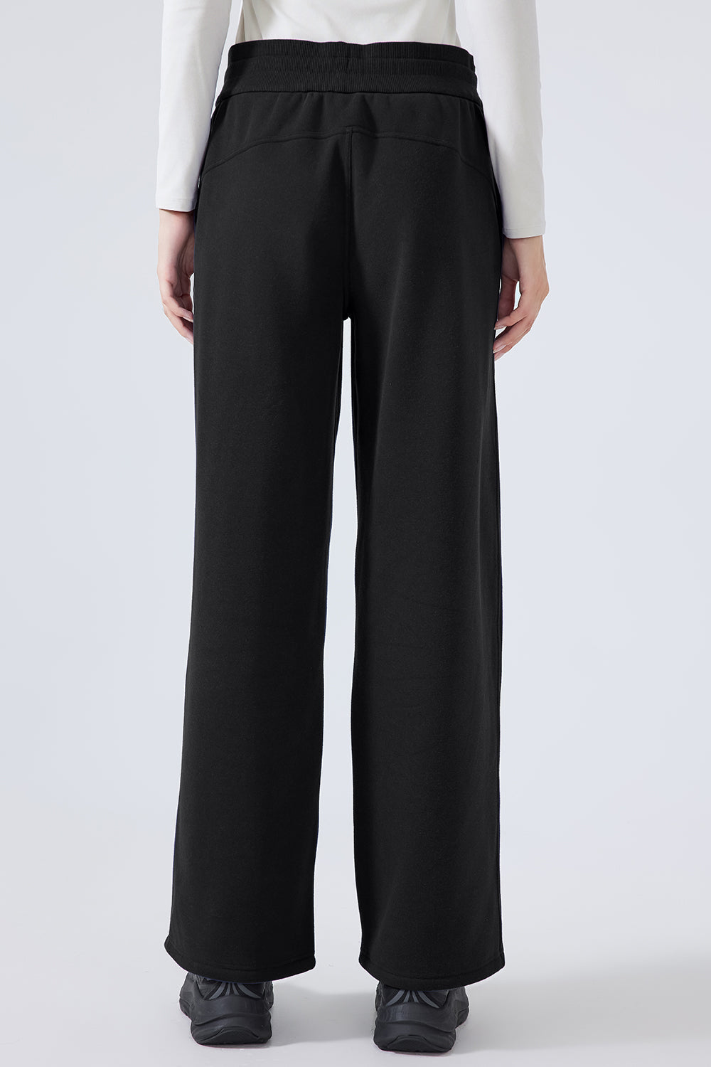 Black relaxed palazzo sweatpants with drawstring waist and wide leg