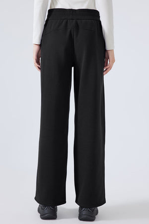 Black relaxed palazzo sweatpants with drawstring waist and wide leg