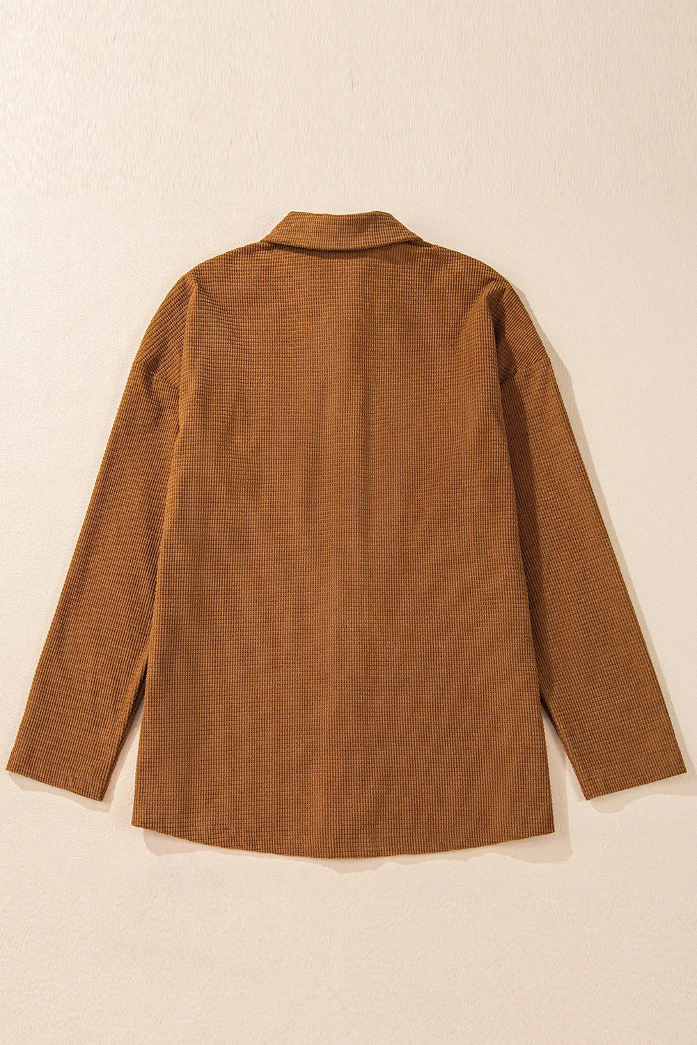 Brown waffle knit overshirt with collar and long sleeves, shown from the back.