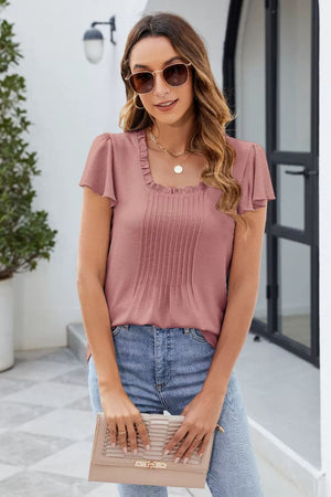 Dusty pink flutter sleeve blouse with square neckline and pintuck detail
