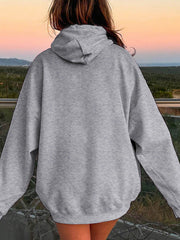 Gray oversized hoodie with pouch pocket and drawstring hood, casual relaxed fit.