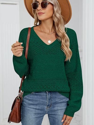 Peacock Blue V-neck sweater with diamond eyelet knit detail and long sleeves.