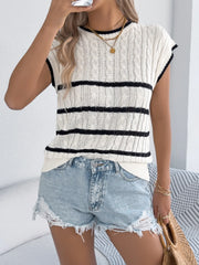 Sleeveless cable knit top with black stripes and crew neck, styled with denim shorts.