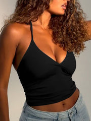 Black halter neck cami with twist detail and V-neckline.