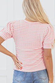Textured stripe puff sleeve top in blush pink with a textured knit fabric.