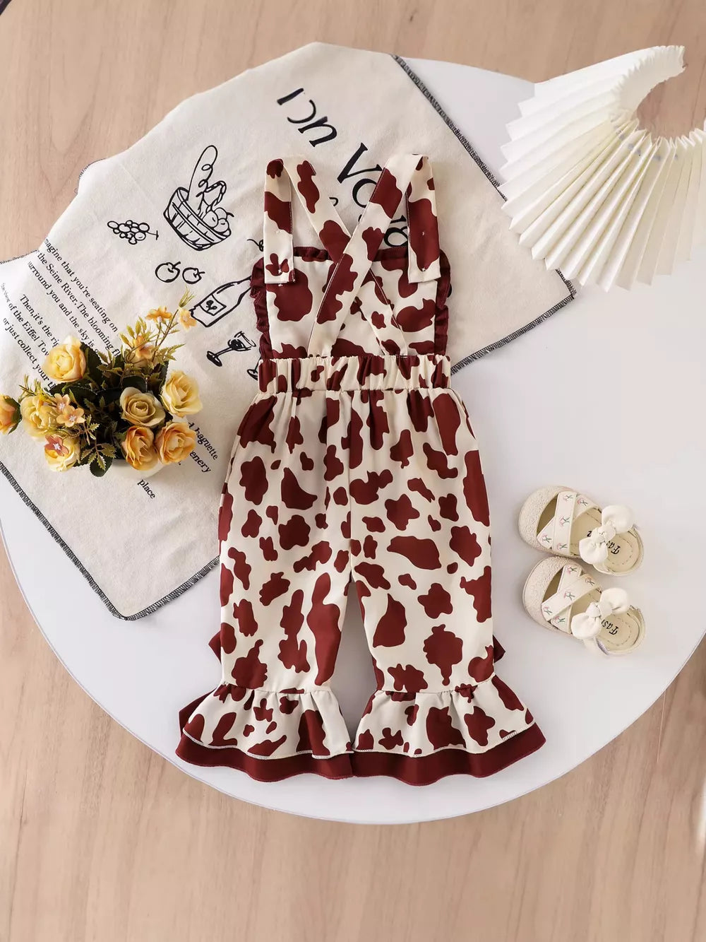 Children's Cow Print Ruffle Jumpsuit in Brown And White, alternate angle