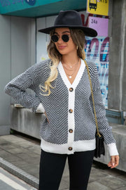 Chevron knit cardigan with contrast trim and buttons, black and white acrylic.