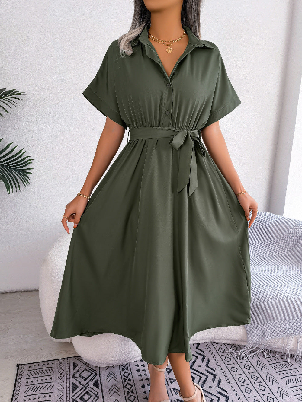 Army green button-down midi dress with short sleeves and a tie belt