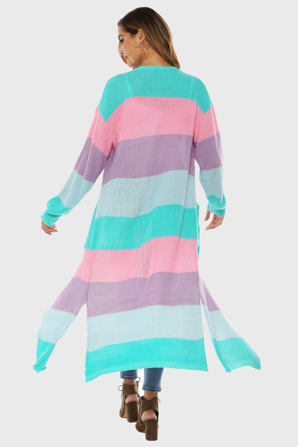 Maxi cardigan with rainbow stripes in aqua, pink, and purple, featuring pockets.