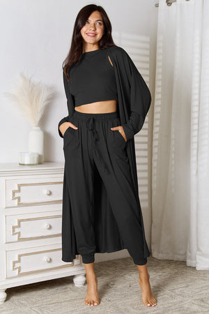 Black loungewear set with cropped top, long duster cardigan, and drawstring pants.