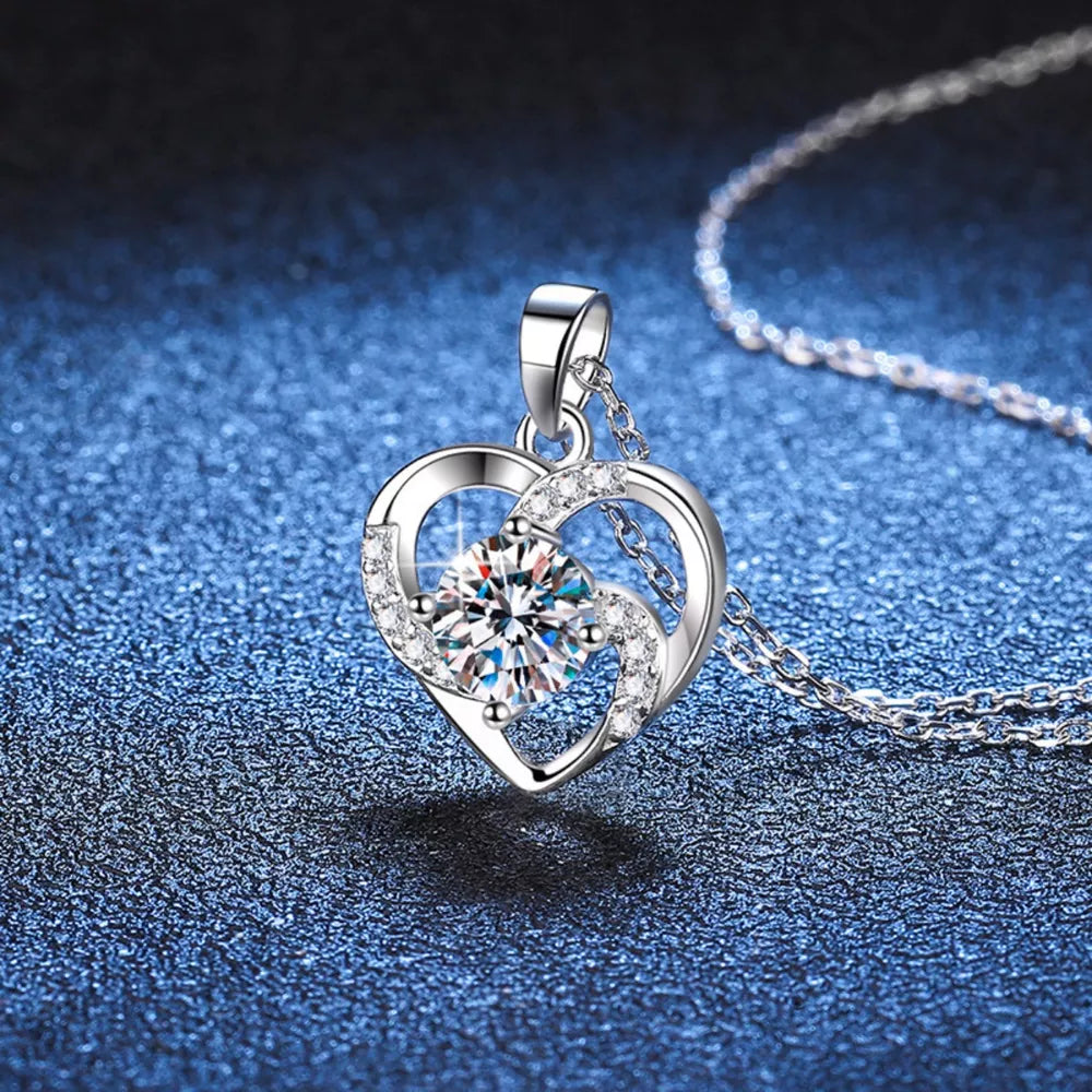 Silver heart pendant necklace with clear zircon and crystal accents
