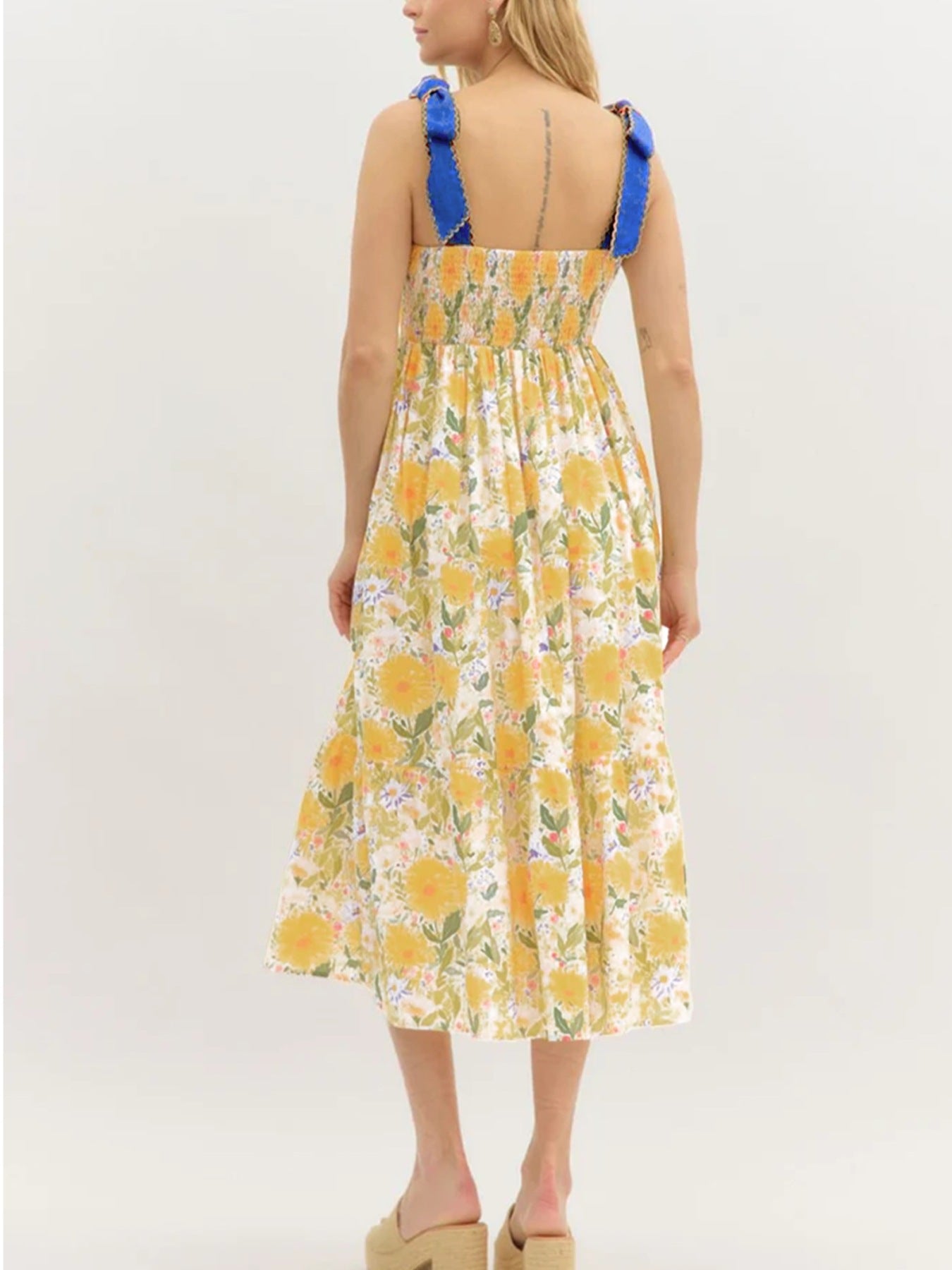 Floral midi dress with smocked bodice and blue tie shoulders