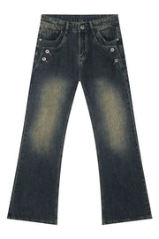 Dark wash bootcut jeans with faded details and button accents