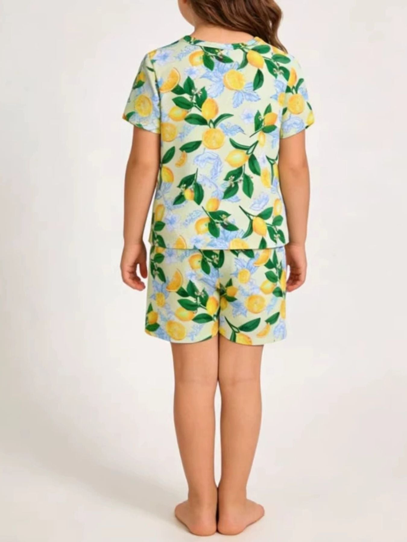 Toddler lemon print tee and shorts set with crew neck and short sleeves.