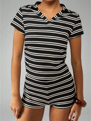 Chic striped knit two-piece set with polo collar and short sleeves in black stripes.
