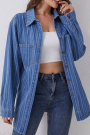 Medium vertical stripe denim overshirt with button front and collar, styled casually.