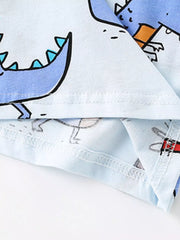 Light blue cotton toddler t-shirt with playful cartoon dinosaur print and contrast stitching.