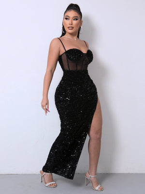 Black sequin corset maxi dress with sheer panel and high slit.
