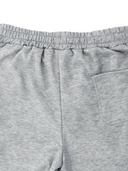 Men's Full Size Side Snap Button Pants Plus Size in Black, model styling view