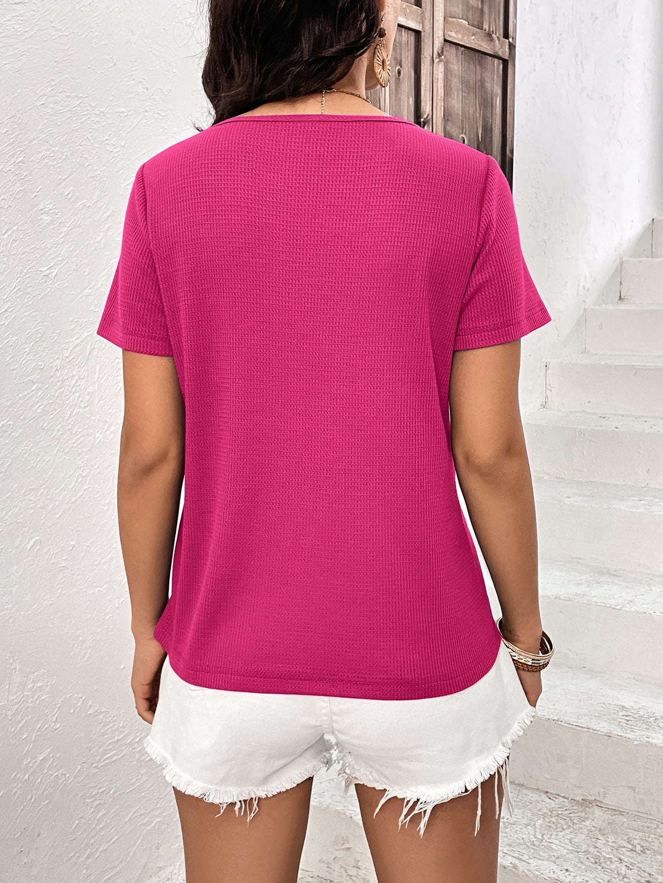 Hot Pink waffle knit tee with short sleeves and a relaxed fit.