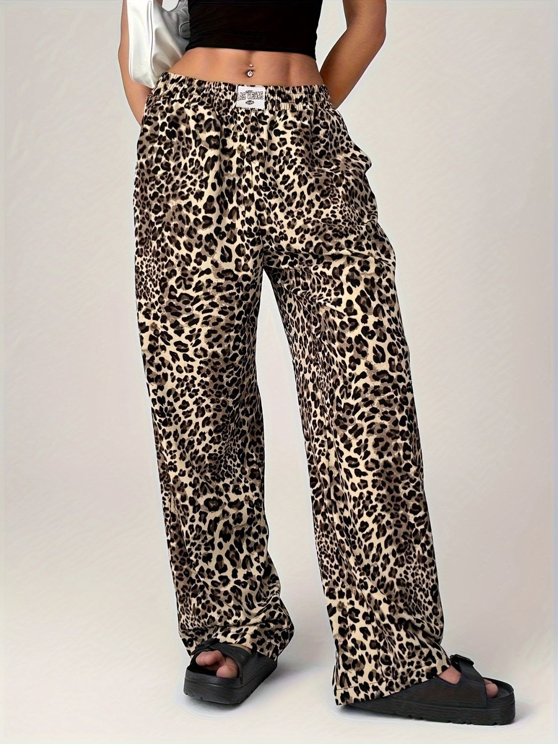 Leopard print palazzo lounge trousers with a relaxed fit and elastic waistband.