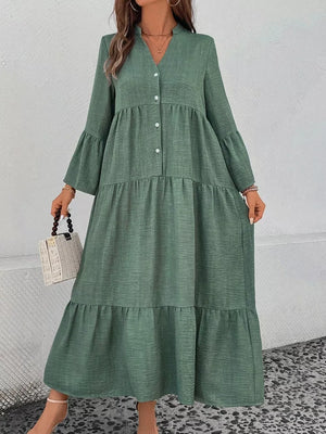 Green tiered ruffle hem v-neck dress with button front and bell sleeves.